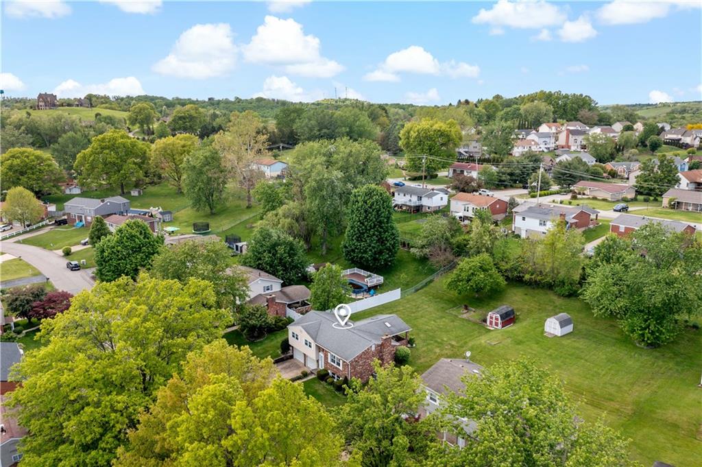 27 Dover Road Irwin, PA 15642 - Photo 39 of 43 a view of a garden with houses