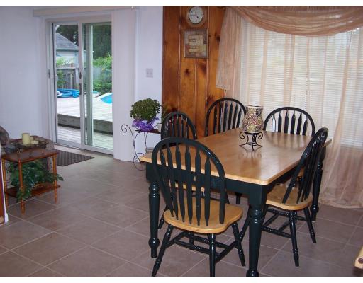 134 Winton Street Springfield, MA 01118 - Photo 3 of 12 a view of a table and chairs in patio