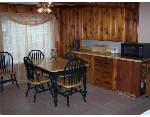 134 Winton Street Springfield, MA 01118 - Photo 4 of 12 a view of a dining room with furniture and chandelier