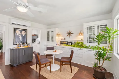 a kitchen with stainless steel appliances a sink a stove and a window