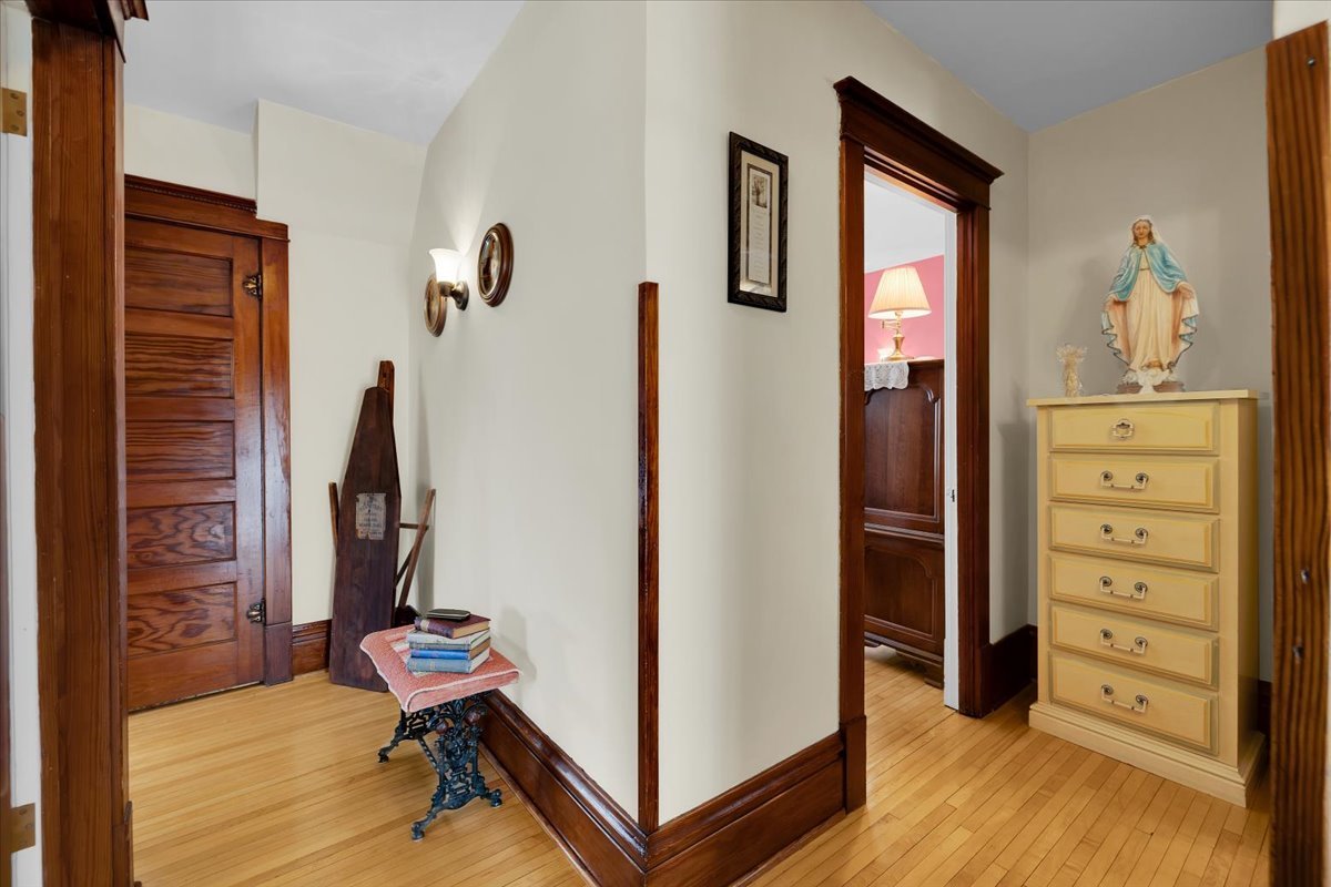 102 Monroe Street Elgin, IL 60123 - Photo 16 of 34 a view of a bedroom with closet and a window