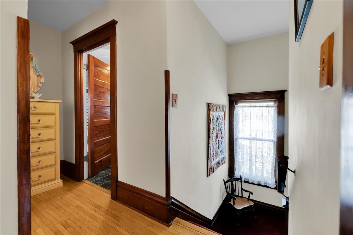 102 Monroe Street Elgin, IL 60123 - Photo 17 of 34 wooden floor and windows in a room