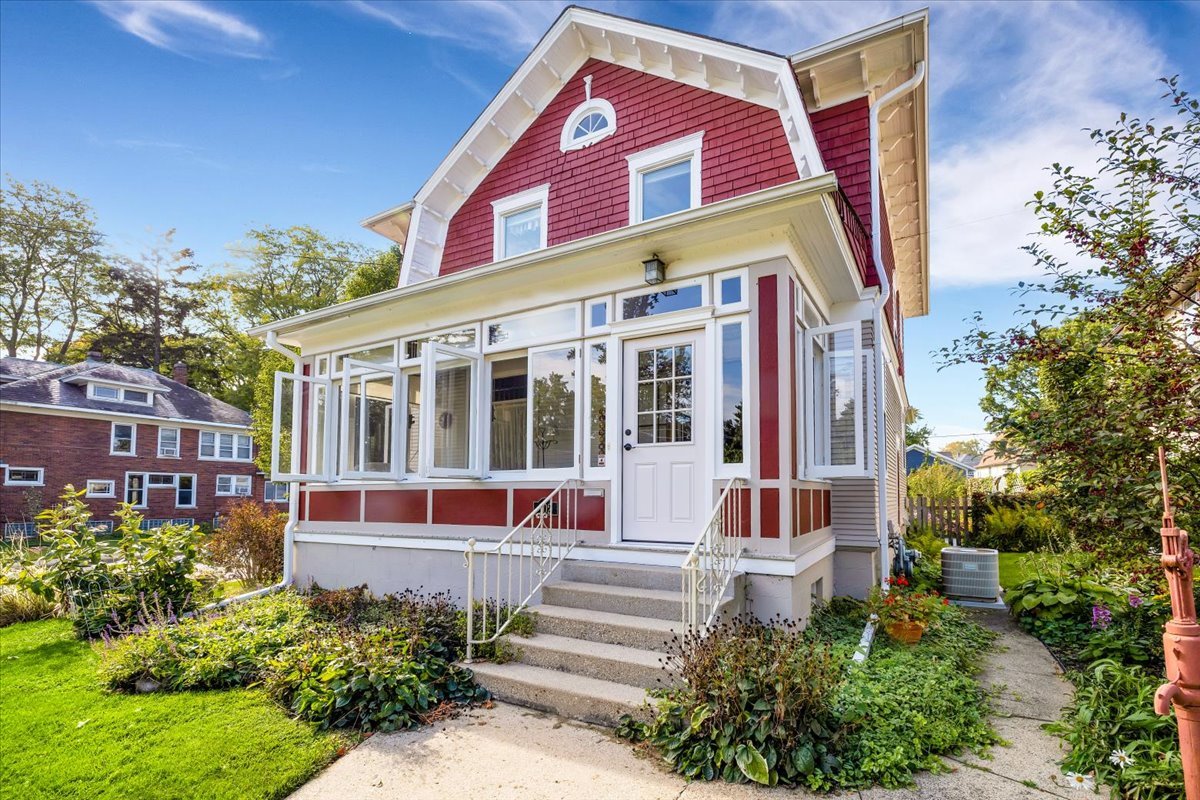 102 Monroe Street Elgin, IL 60123 - Photo 2 of 34 a front view of a multi story residential apartment building