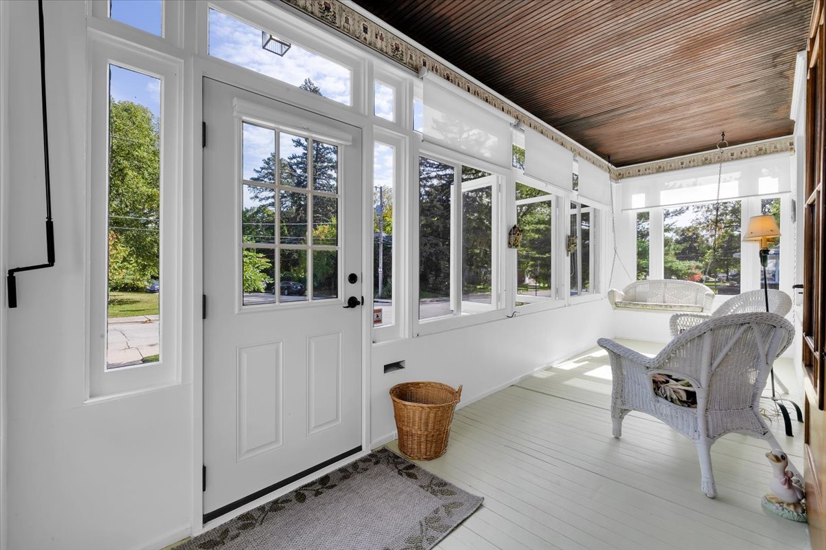 102 Monroe Street Elgin, IL 60123 - Photo 4 of 34 a view of a patio with chairs and potted plants