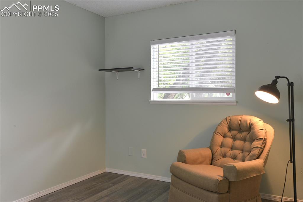 575 Blossom Field Road Fountain, CO 80817 - Photo 13 of 24 a room with furniture and a window