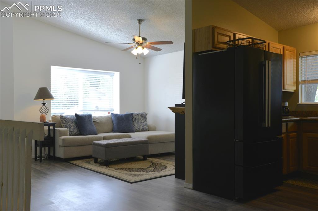 575 Blossom Field Road Fountain, CO 80817 - Photo 6 of 24 a living room with furniture and a window