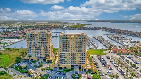 a view of city with ocean