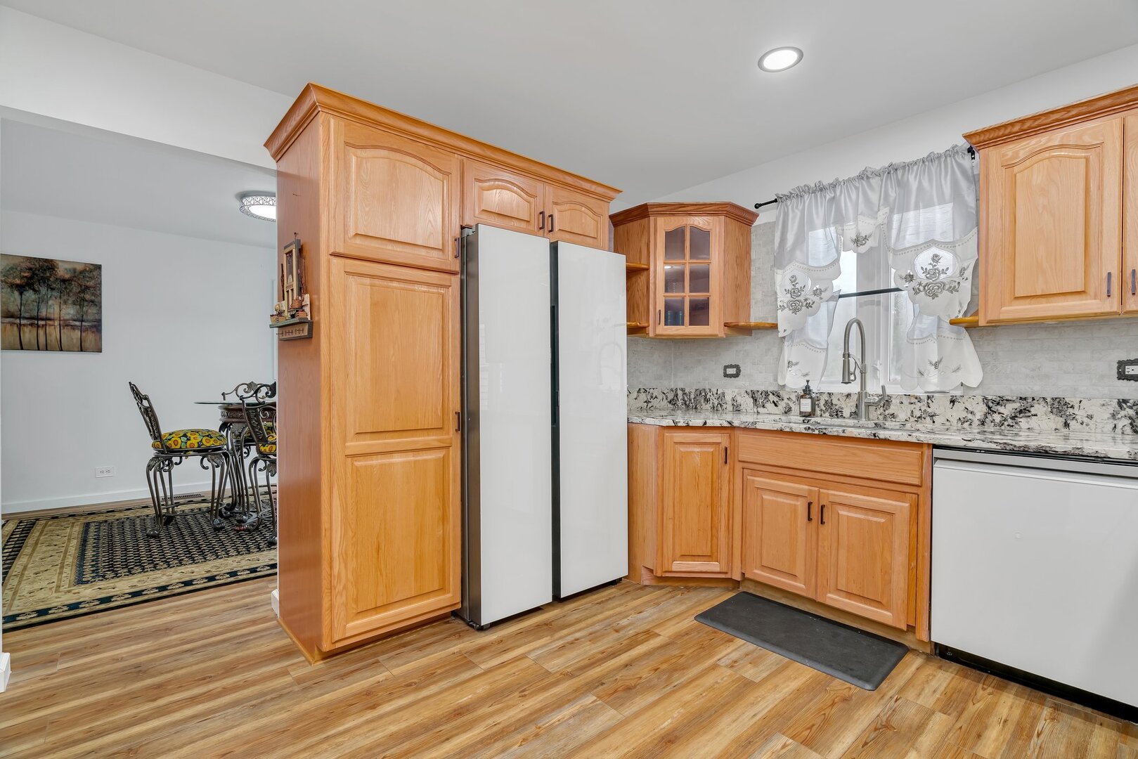 35924 Gray Road Custer Park, IL 60481 - Photo 9 of 43 a kitchen with stainless steel appliances granite countertop a refrigerator and a stove top oven