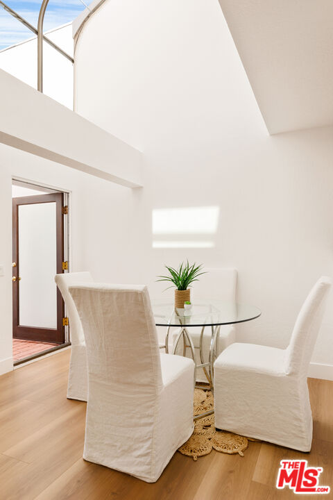 29221 Heathercliff Road, Unit 13 Malibu, CA 90265 - Photo 17 of 43 a living room with furniture and a potted plant