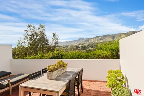 a view of an outdoor space with seating