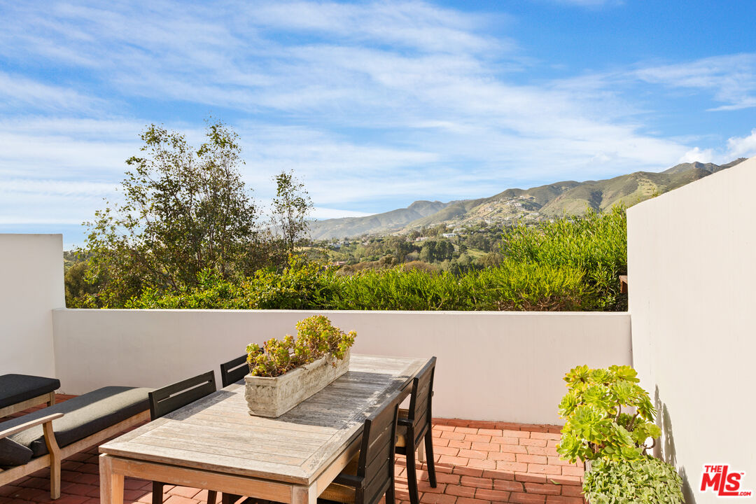 29221 Heathercliff Road, Unit 13 Malibu, CA 90265 - Photo 18 of 43 a view of an outdoor space with seating