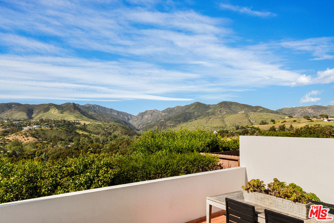 29221 Heathercliff Road, Unit 13 Malibu, CA 90265 - Photo 22 of 43 a view of a city from a terrace