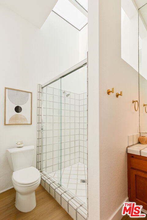 29221 Heathercliff Road, Unit 13 Malibu, CA 90265 - Photo 37 of 43 a bathroom with a toilet and a shower