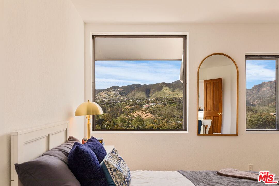 29221 Heathercliff Road, Unit 13 Malibu, CA 90265 - Photo 5 of 43 a picture of a window in a room