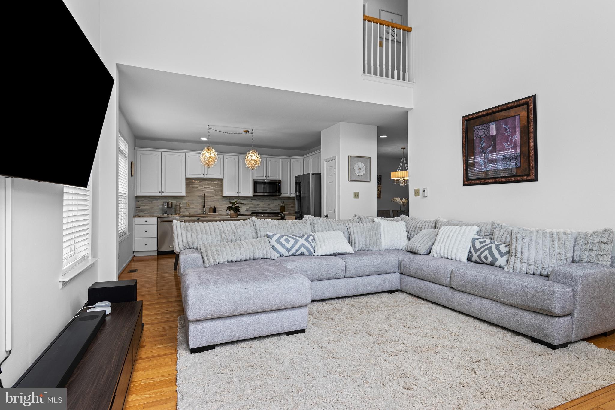 805 Hinchley Run West Chester, PA 19382 - Photo 23 of 53 a living room with furniture and a flat screen tv