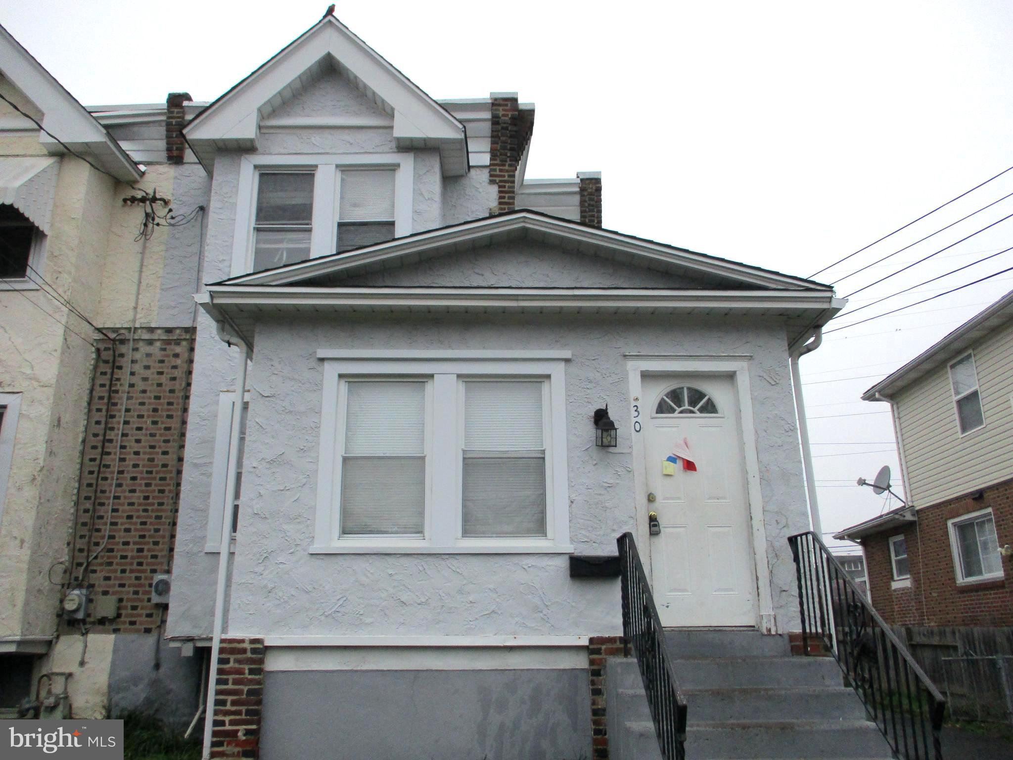 30 North Ridgeway Avenue Glenolden, PA 19036 - Photo 1 of 20 a front view of a house with a yard
