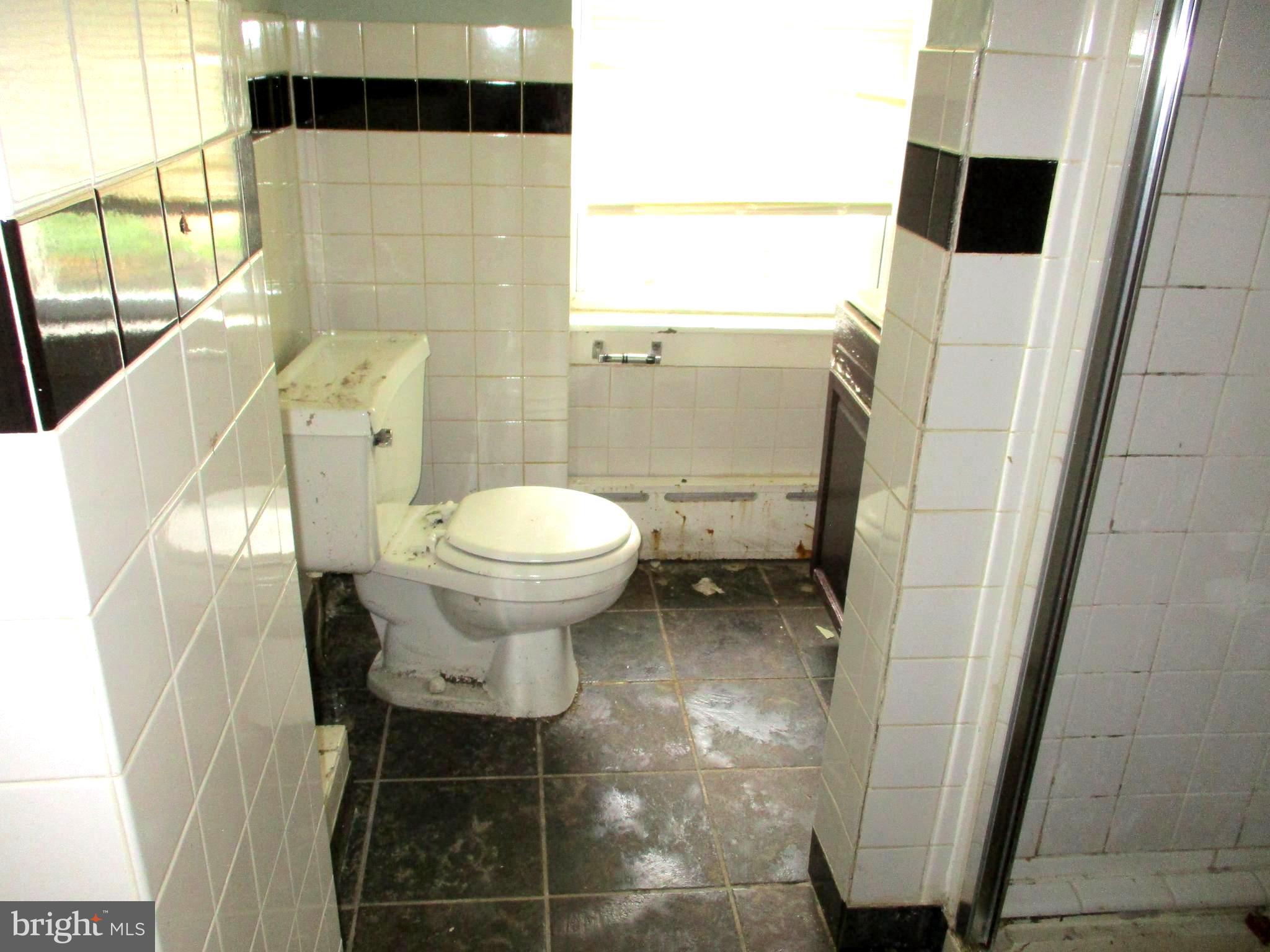 30 North Ridgeway Avenue Glenolden, PA 19036 - Photo 15 of 20 a bathroom with a sink and a toilet
