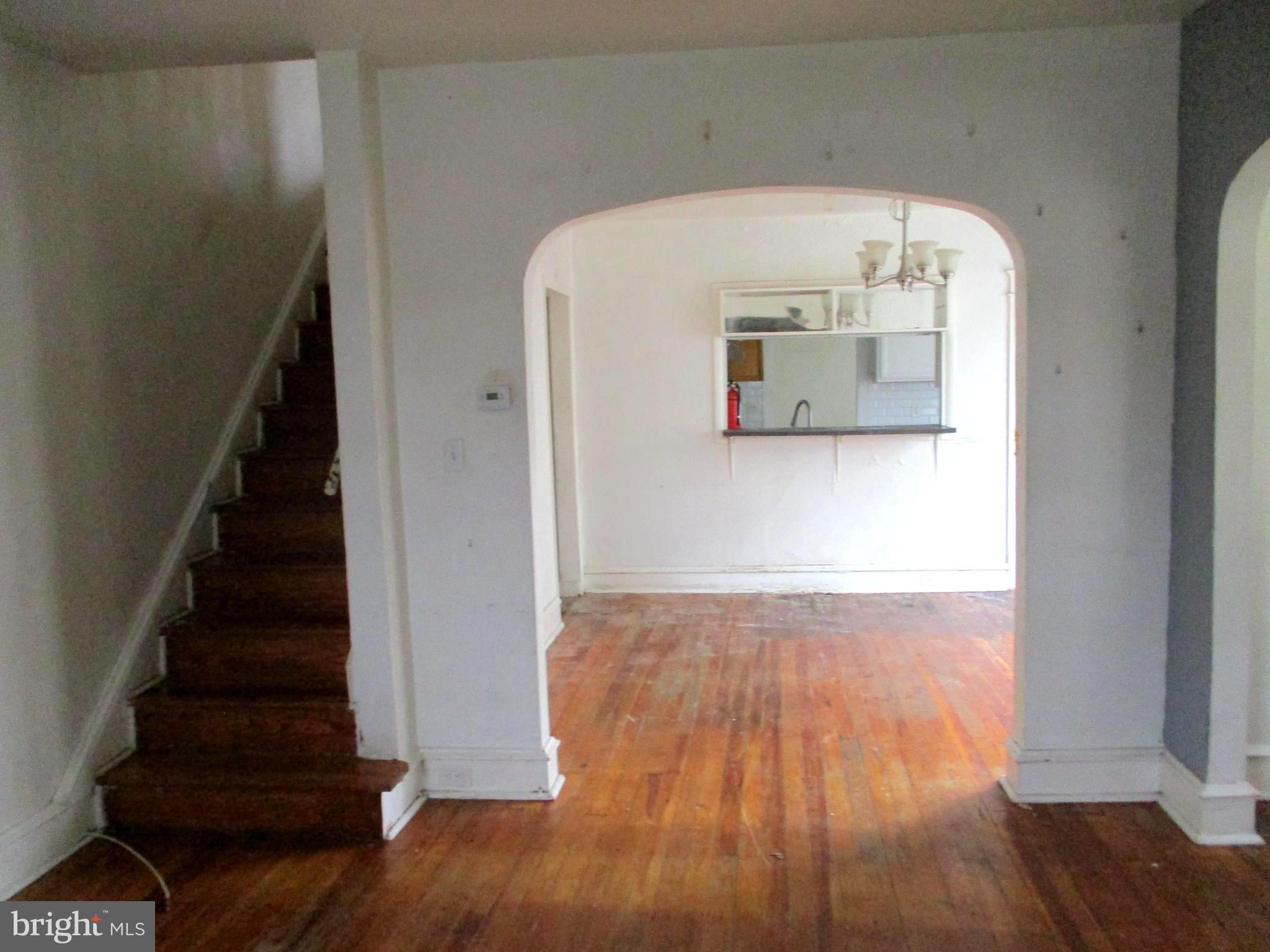 30 North Ridgeway Avenue Glenolden, PA 19036 - Photo 5 of 20 a view of a hallway with wooden floor and entryway