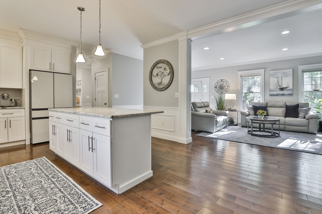 4 Spring Hill Road West Newbury, MA 01985 - Photo 10 of 38 a very nice looking living room with wooden floor and furniture