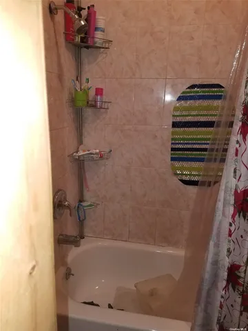 a bathroom with a bathtub