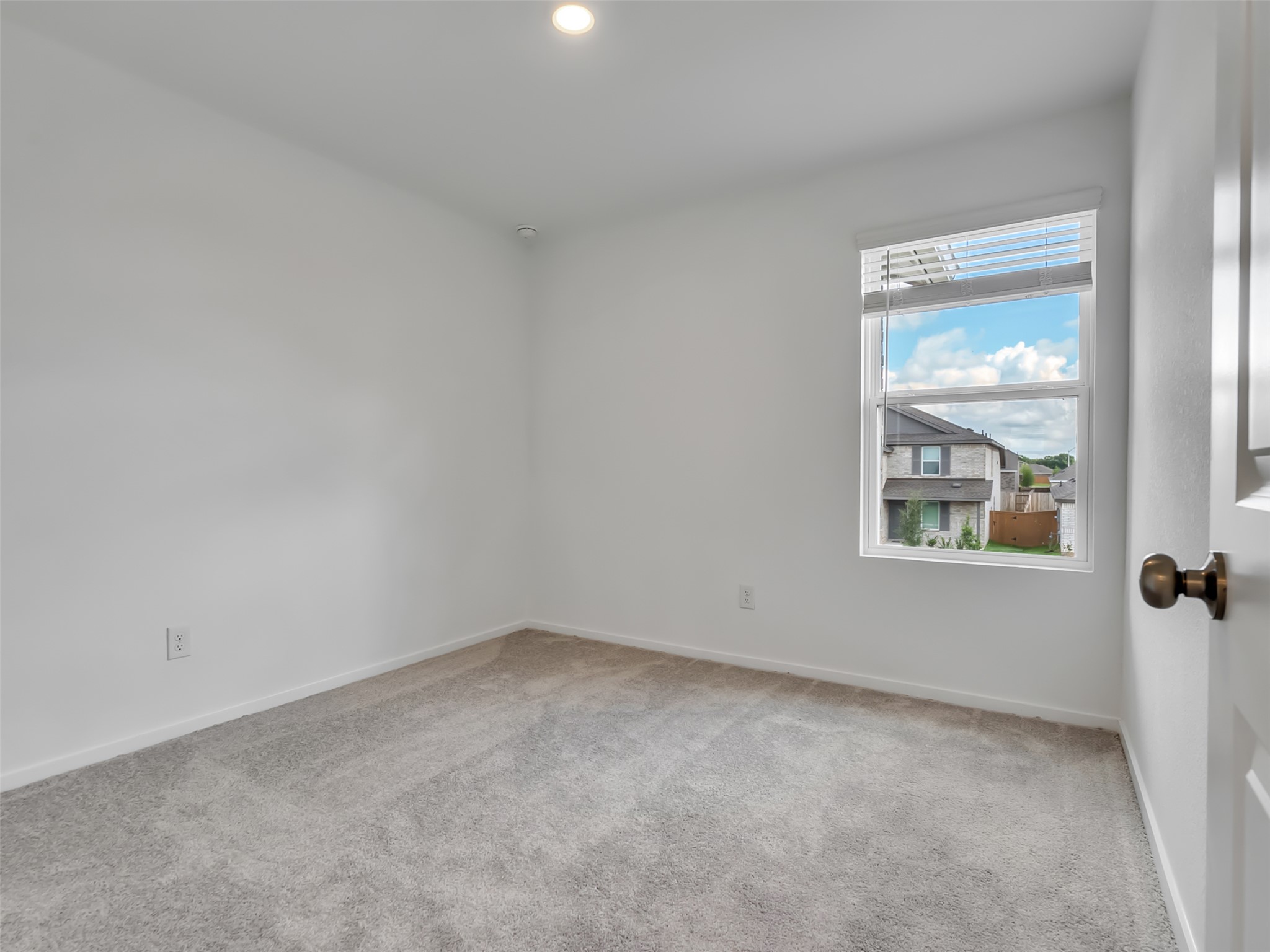 3041 Colusa Rdg Drive Katy, TX 77493 - Photo 18 of 26 an empty room with a window
