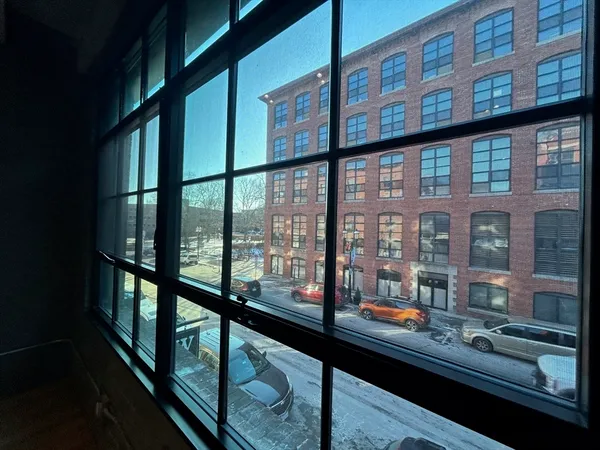 a view of a building from a balcony