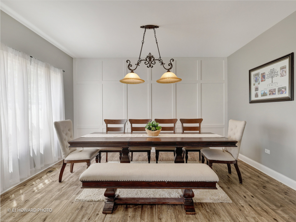 16308 Palomino Path Manhattan, IL 60442 - Photo 13 of 39 a view of a room that has a table and chairs in it