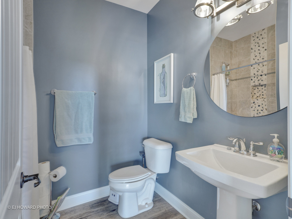 16308 Palomino Path Manhattan, IL 60442 - Photo 23 of 39 a bathroom with a toilet sink and mirror