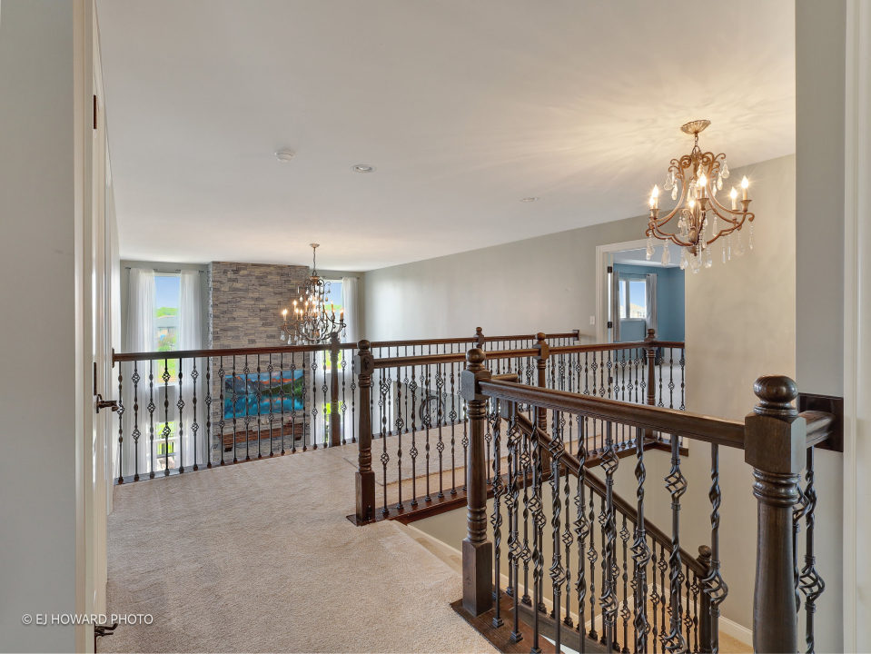 16308 Palomino Path Manhattan, IL 60442 - Photo 25 of 39 a view of a livingroom with wooden floor and windows