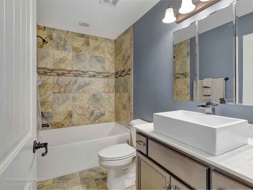 16308 Palomino Path Manhattan, IL 60442 - Photo 26 of 39 a bathroom with a sink a toilet and shower