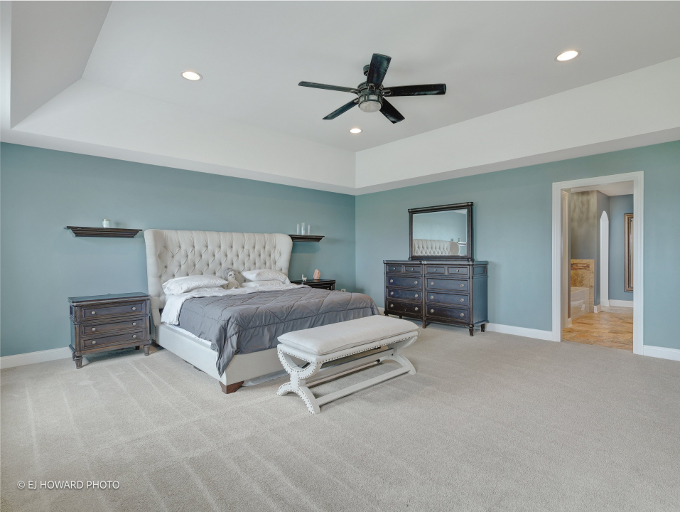 16308 Palomino Path Manhattan, IL 60442 - Photo 35 of 39 a spacious bedroom with a bed and furniture