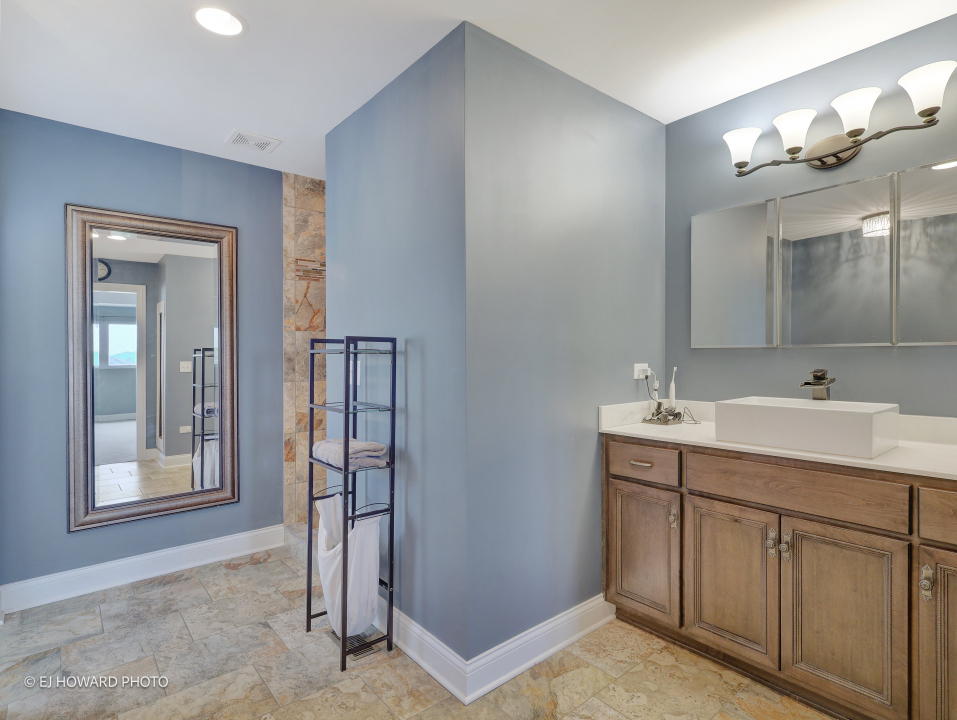 16308 Palomino Path Manhattan, IL 60442 - Photo 36 of 39 a bathroom with a sink and a mirror