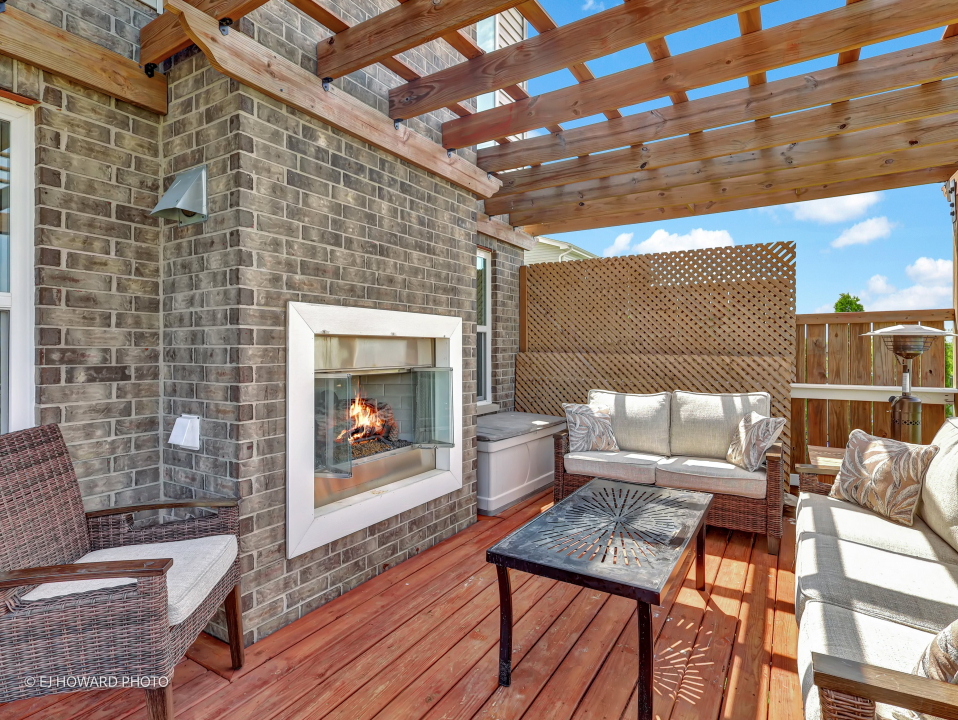 16308 Palomino Path Manhattan, IL 60442 - Photo 9 of 39 a outdoor living space with patio furniture and a fireplace