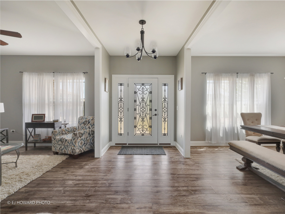16308 Palomino Path Manhattan, IL 60442 - Photo 10 of 39 a view of a livingroom with furniture and windows