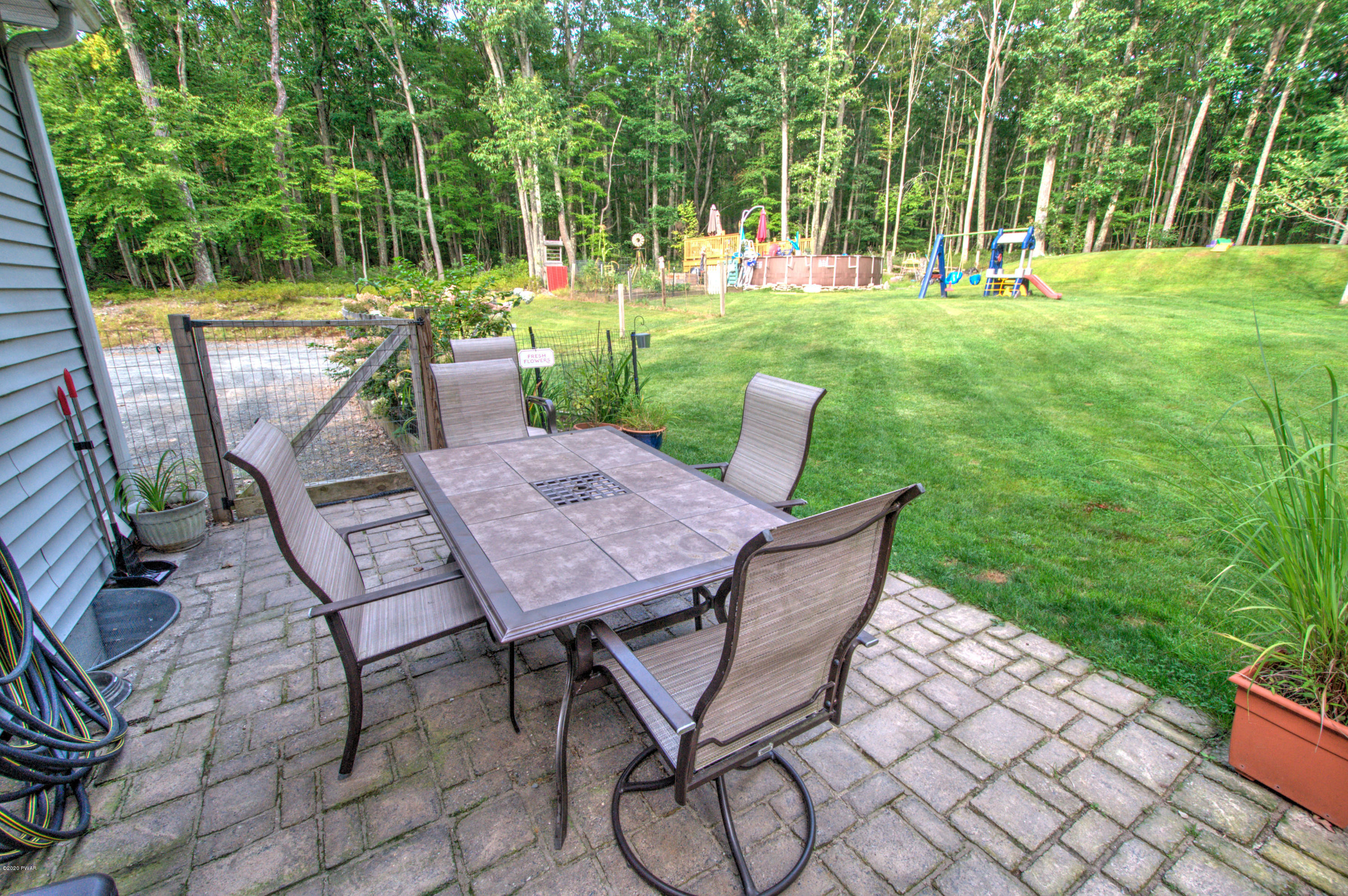 141 Beaverdam Road Tafton, PA 18464 - Photo 46 of 59 45-Deck - pavers & yard