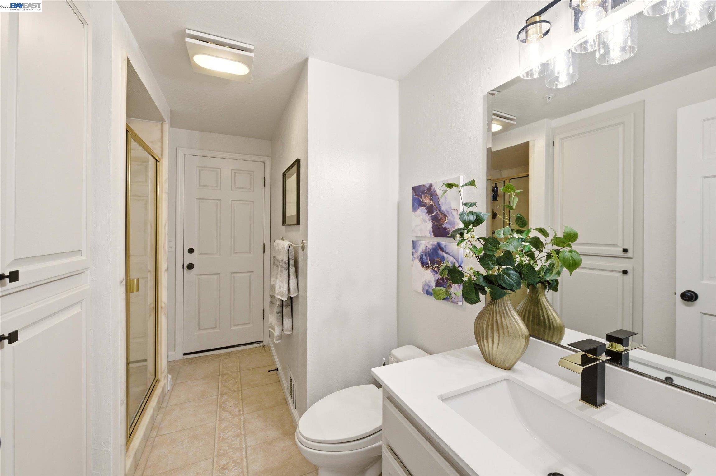 28 Harrington Road Moraga, CA 94556 - Photo 13 of 49 Bathroom has a door that leads to the backyard. Perfect for outdoor entertaining.