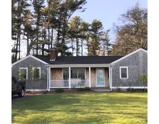 219 Marion Road Rochester, MA 02770 - Photo 1 of 20 a view of a house with a swimming pool