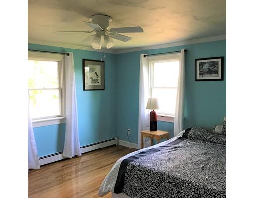 219 Marion Road Rochester, MA 02770 - Photo 11 of 20 a bedroom with a bed and a window