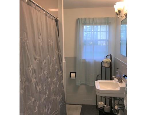 219 Marion Road Rochester, MA 02770 - Photo 8 of 20 a bathroom with a sink and a mirror