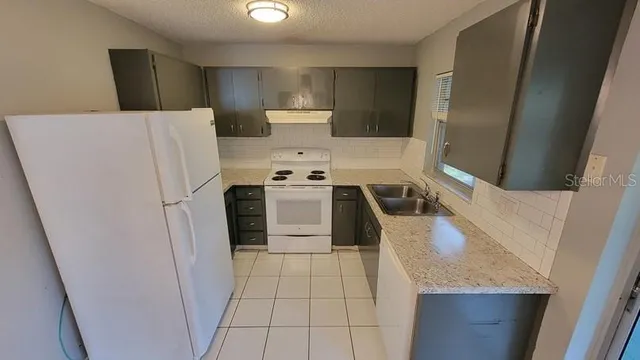 a utility room with washer and dryer