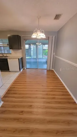 a room with pool table and flat screen tv