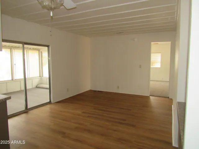 a view of an empty room and window