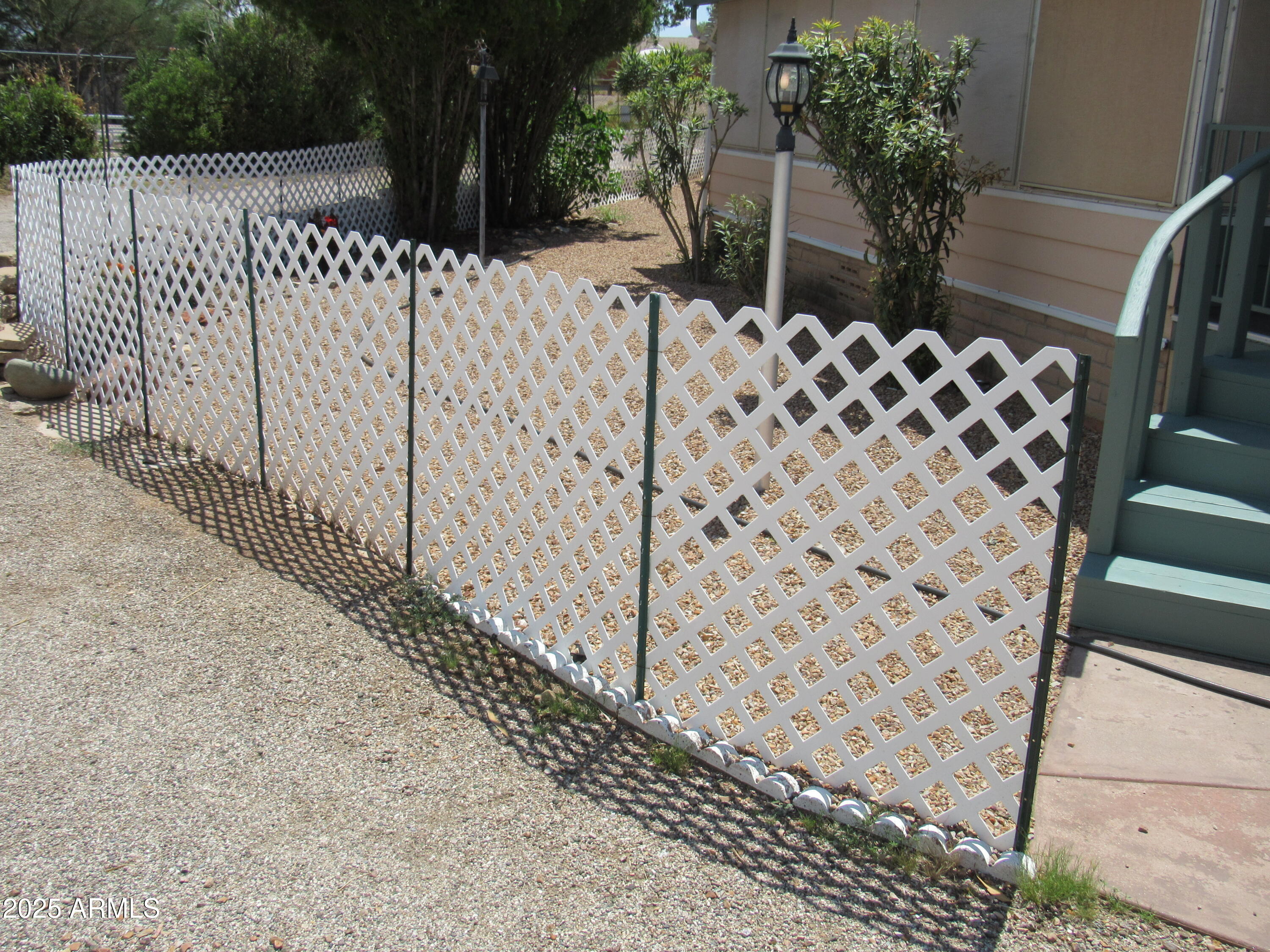 3411 South Camino Seco, Unit 70 Tucson, AZ 85730 - Photo 4 of 22 a view of a backyard