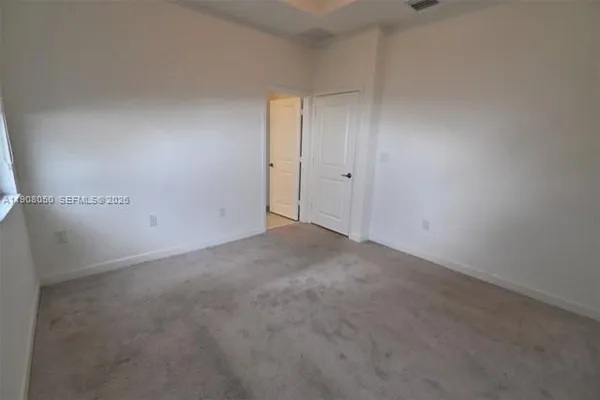 a view of an empty room and entrance