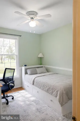 a bathroom with a toilet and a bathtub