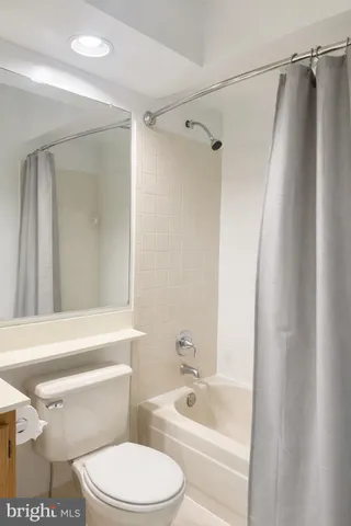 a view of staircase with white walls