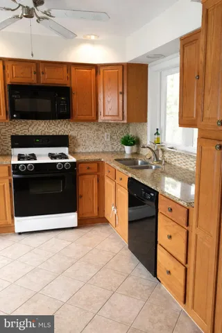 a living room with furniture and windows
