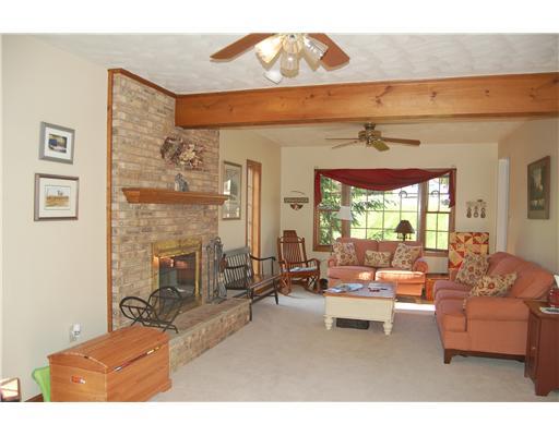113 Ruth Way McDonald, PA 15057 - Photo 12 of 18 Den/Family/Great Room. Family Room with Bay window and access to 16 X 16 deck.