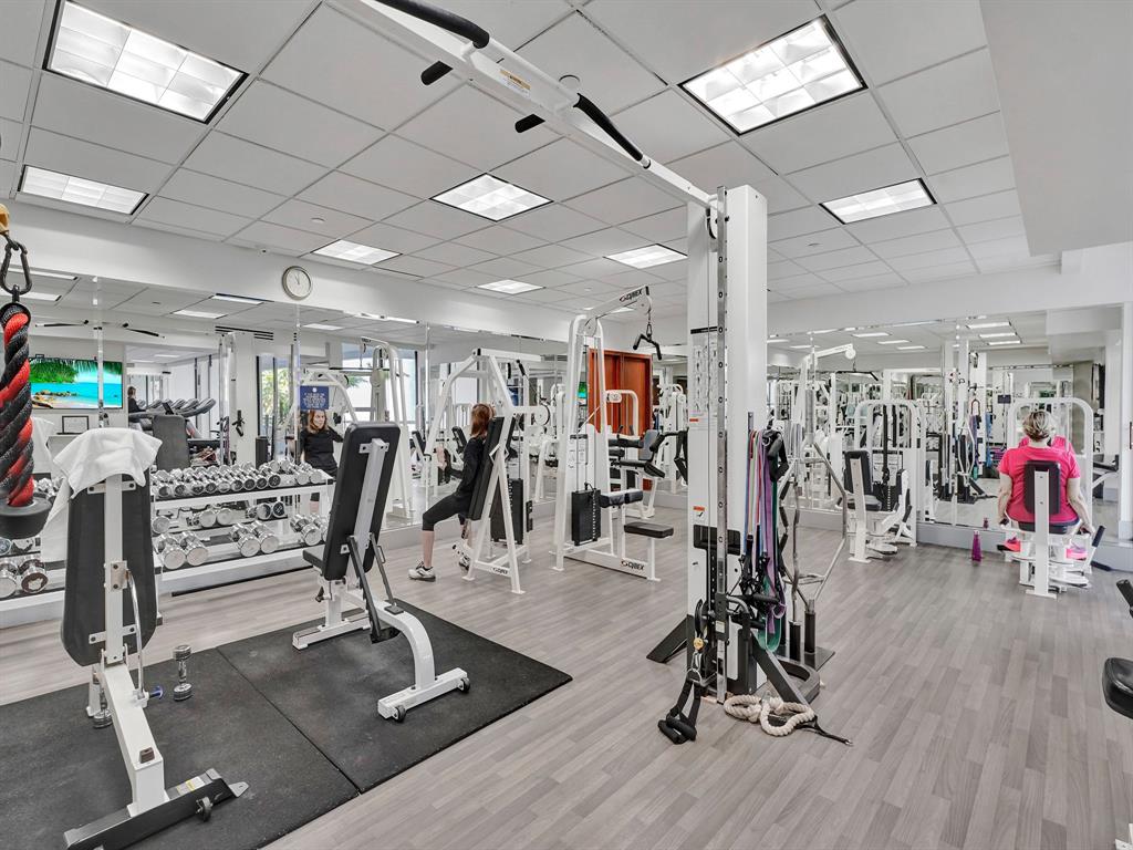 19707 Turnberry Way, Unit 8L Miami, FL 33180 - Photo 33 of 39 a view of a room with gym equipment