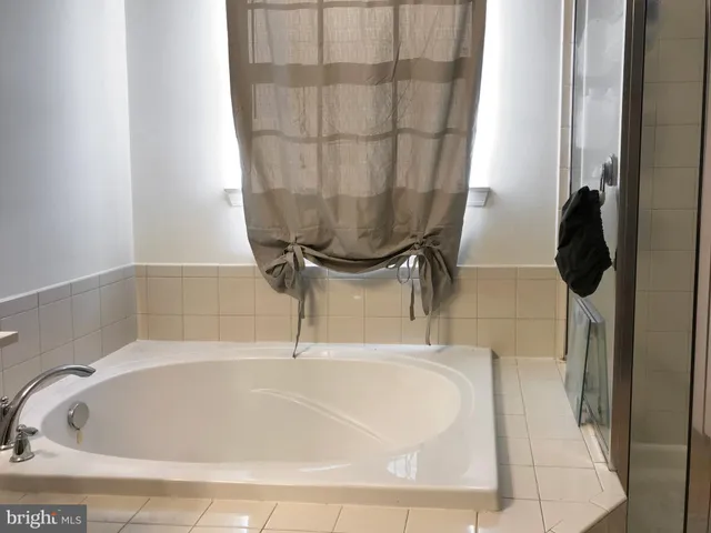 a bathroom with a bathtub
